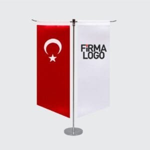 T Direkli Yan Kesim Masa Bayrağı ile prestijinizi yansıtın! Yüksek kaliteli ve şık tasarımlarımızla ofisinizde fark yaratın. Özel üretim seçenekleri ve hızlı teslimat imkanıyla istediğiniz masa bayrağını kolayca sipariş verin. Kurumsal kimliğinizi en iyi şekilde temsil eden masa bayrakları için hemen tıklayın!